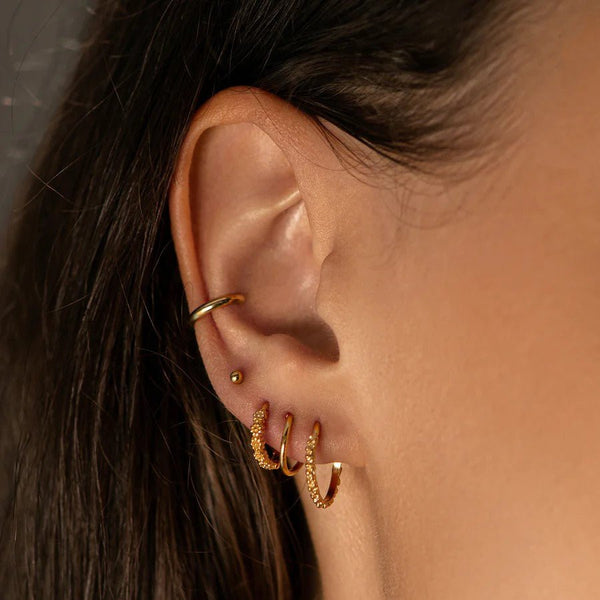 Trendjuwelier Bemelmans - MIAB Bubbly Twister Oorringen Goud